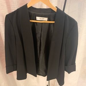 this black blazer can be worn to work